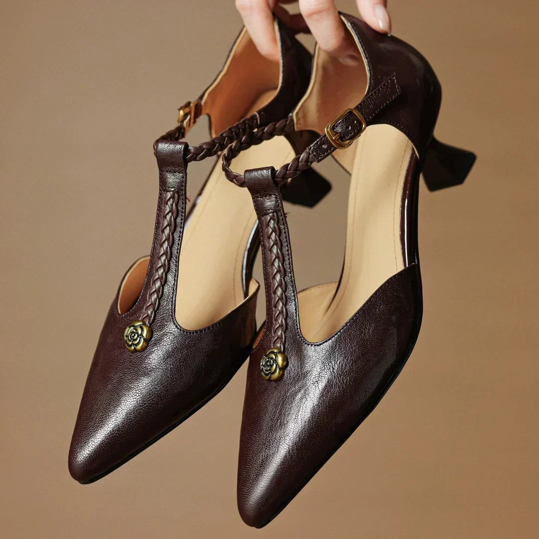 Kathy leather sandals in brown, pair held up showing pointed toe