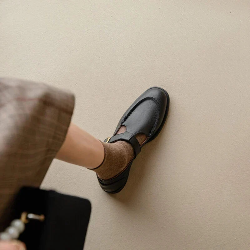 Nancy leather shoes in black, side view worn with brown socks