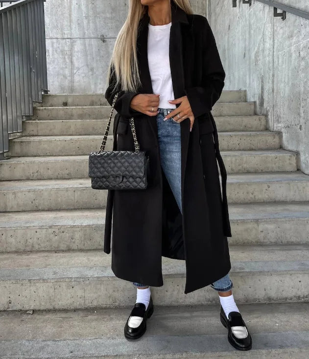 Gwyneth long lapel coat in black, full-length front view with jeans