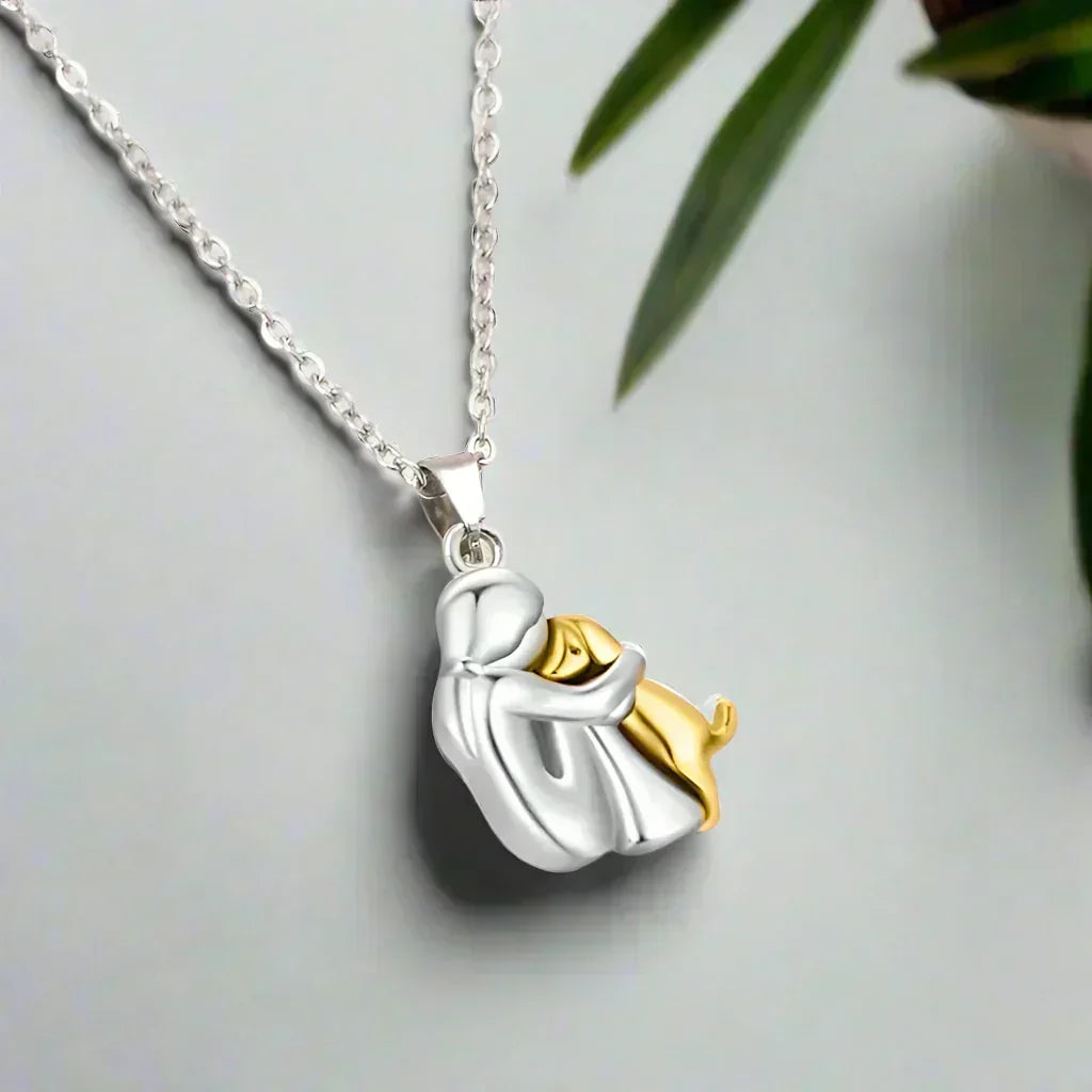 Eternal Friendship pendant in silver and gold on fine chain, angled view