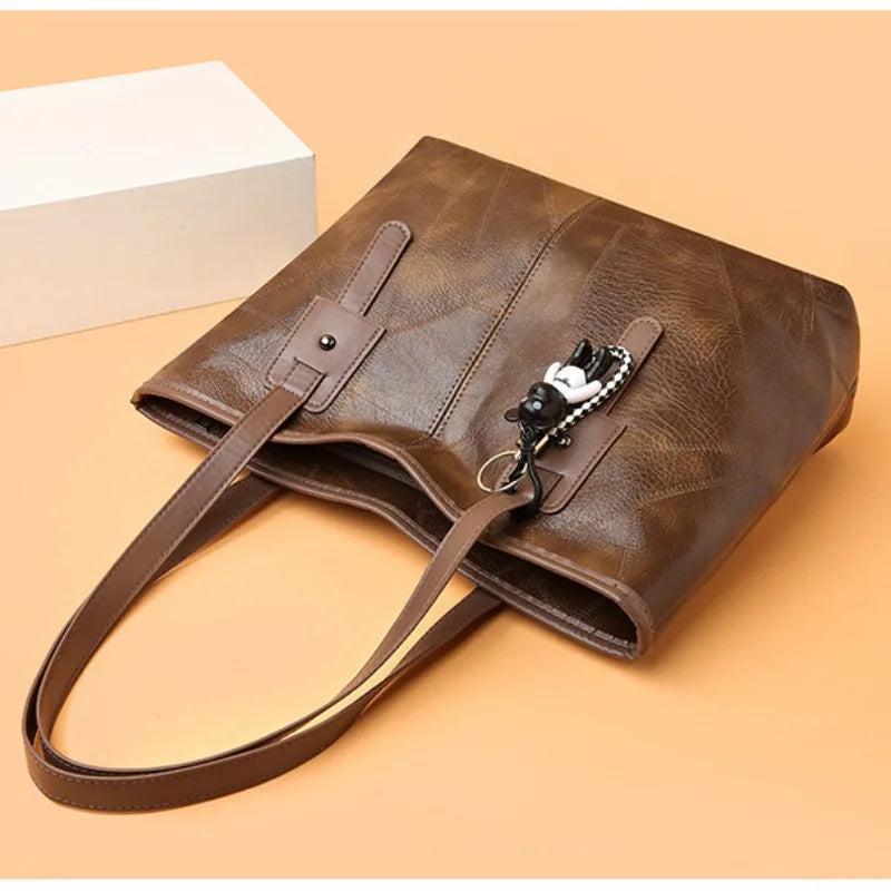 Susan vintage tote bag in khaki, open top view with strap tab detail