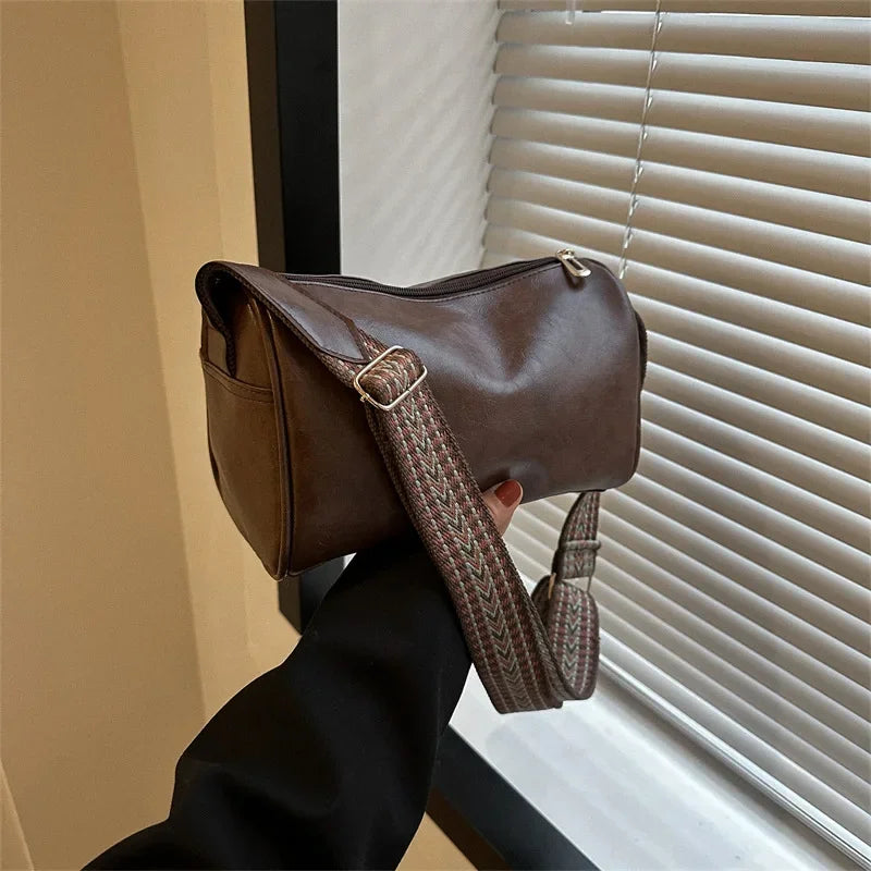 Florence crossbody bag in dark brown, side view