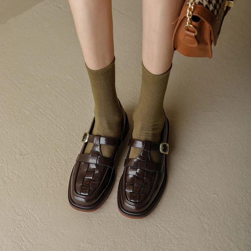 Isava vintage-style retro flats in brown, front view worn with olive socks