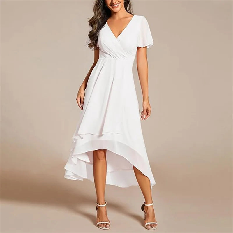 Ismey elegant flowing dress in white, high-low hem front view