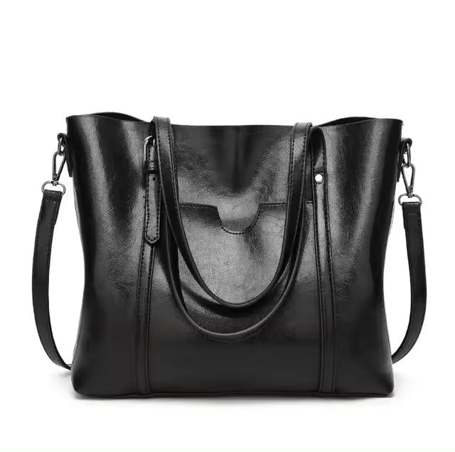 Daphira sleek shoulder bag in black, front view