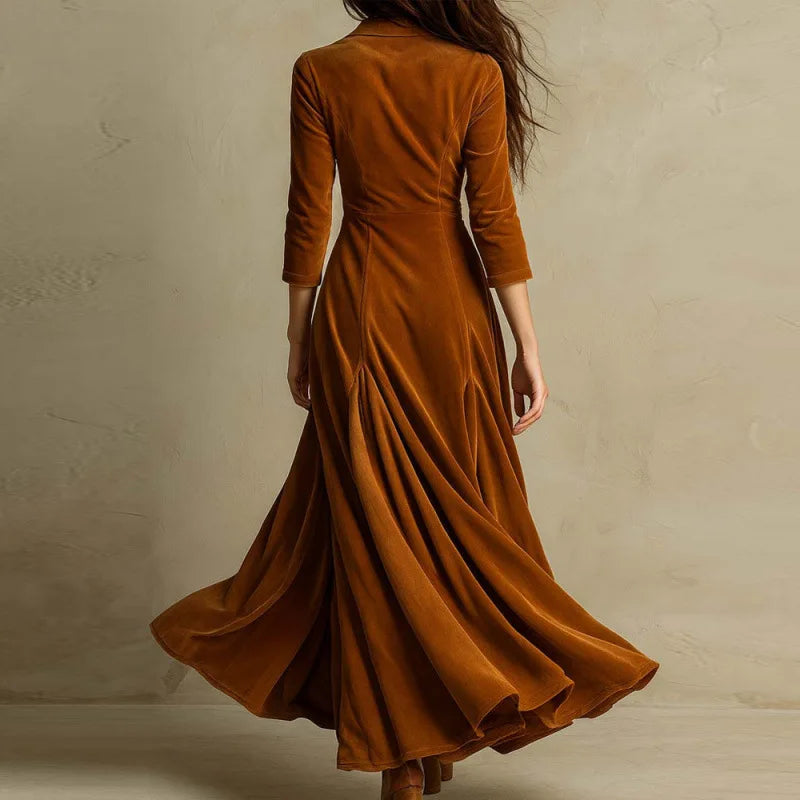 Marlow velvet maxi dress in caramel brown, back view of flared skirt