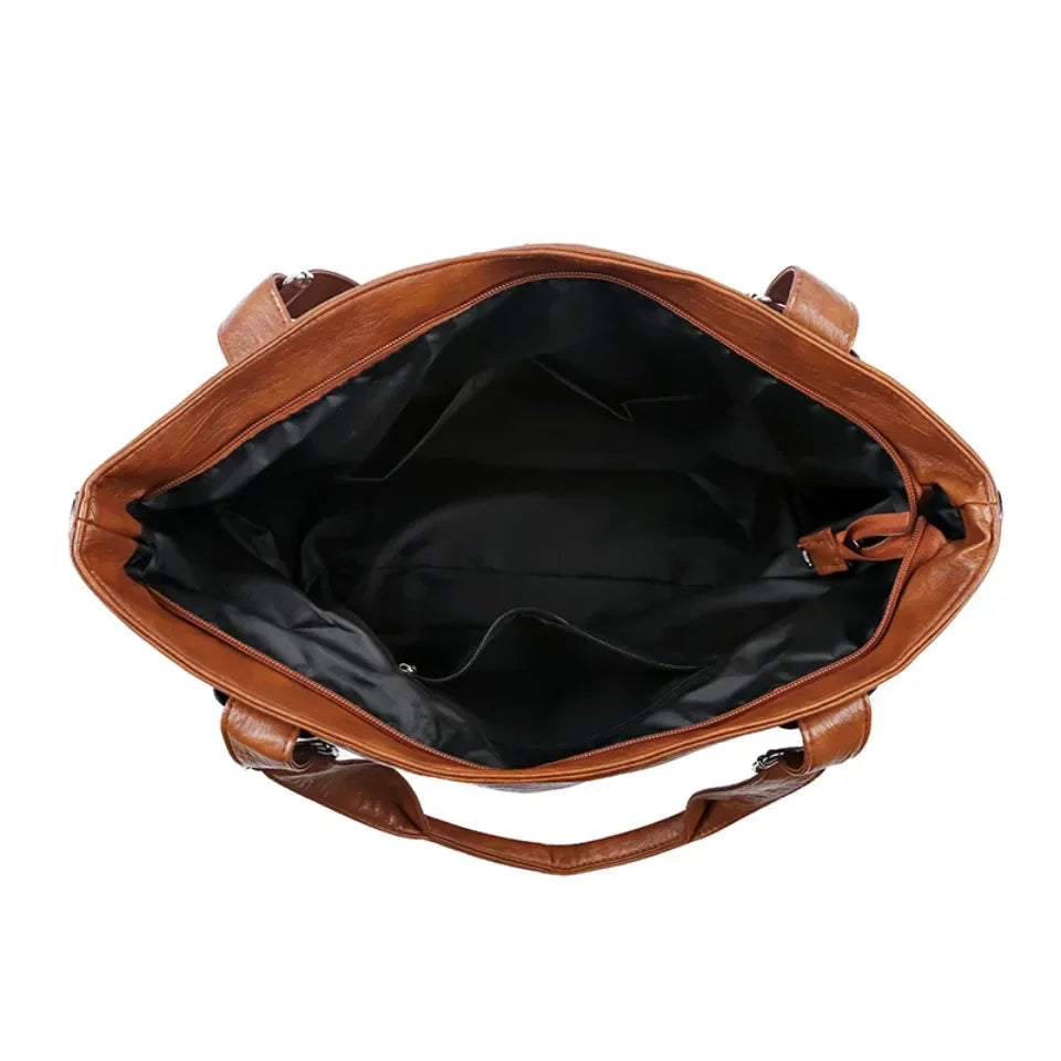 Inside of retro shoulder tote bag showing roomy compartment and slip pockets