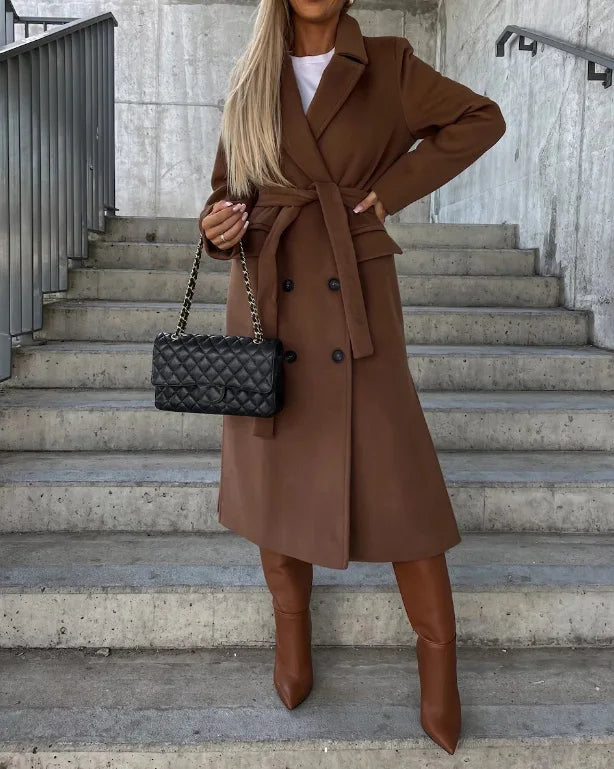 Gwyneth long lapel coat in brown, belted view worn with boots