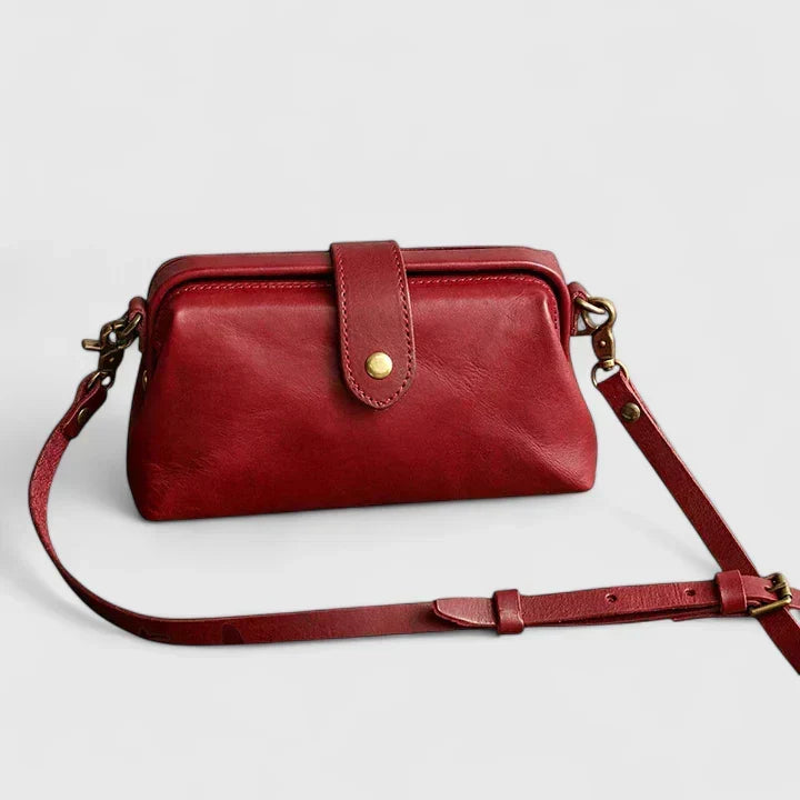 Isola structured leather shoulder bag in red, front view