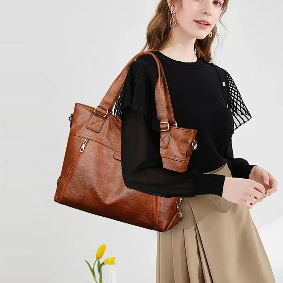 Model carrying retro shoulder tote bag in yellow brown on the shoulder