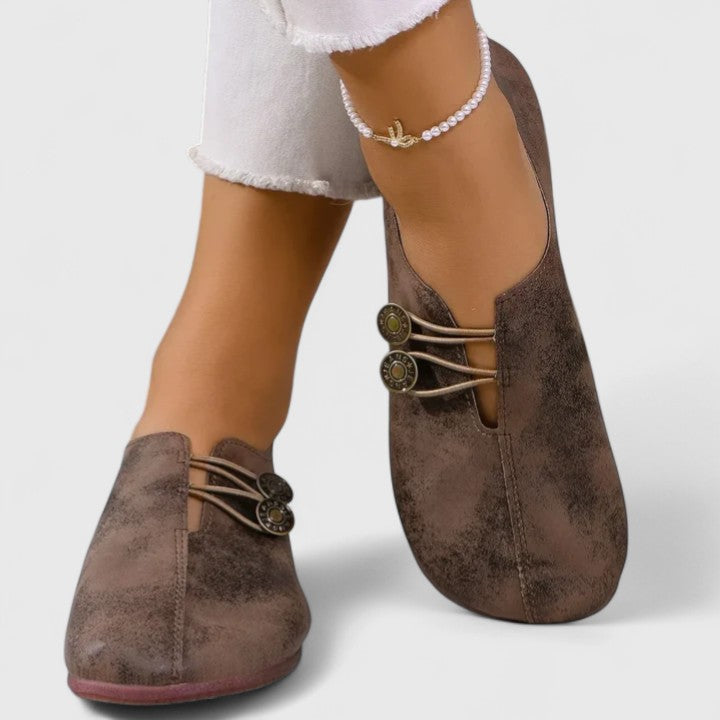 Georgina loafers in dark brown, close-up of button and loop detail