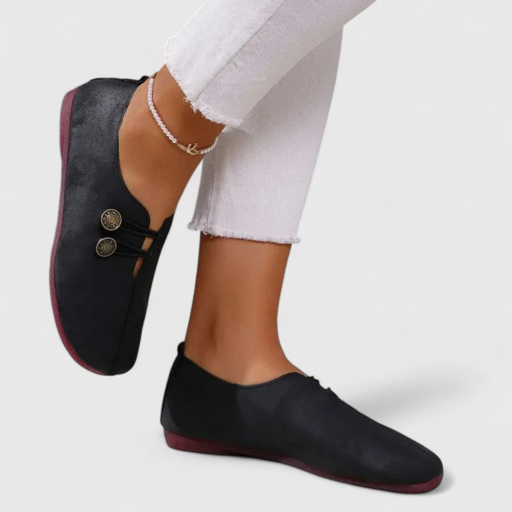 Georgina loafers in black worn with white cropped jeans