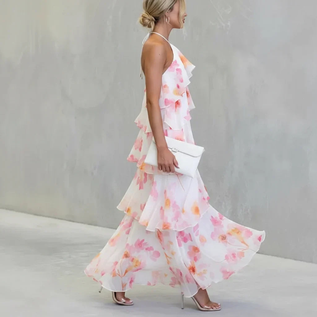 Estrella tiered floral dress in white and pink, side view showing flowing layers