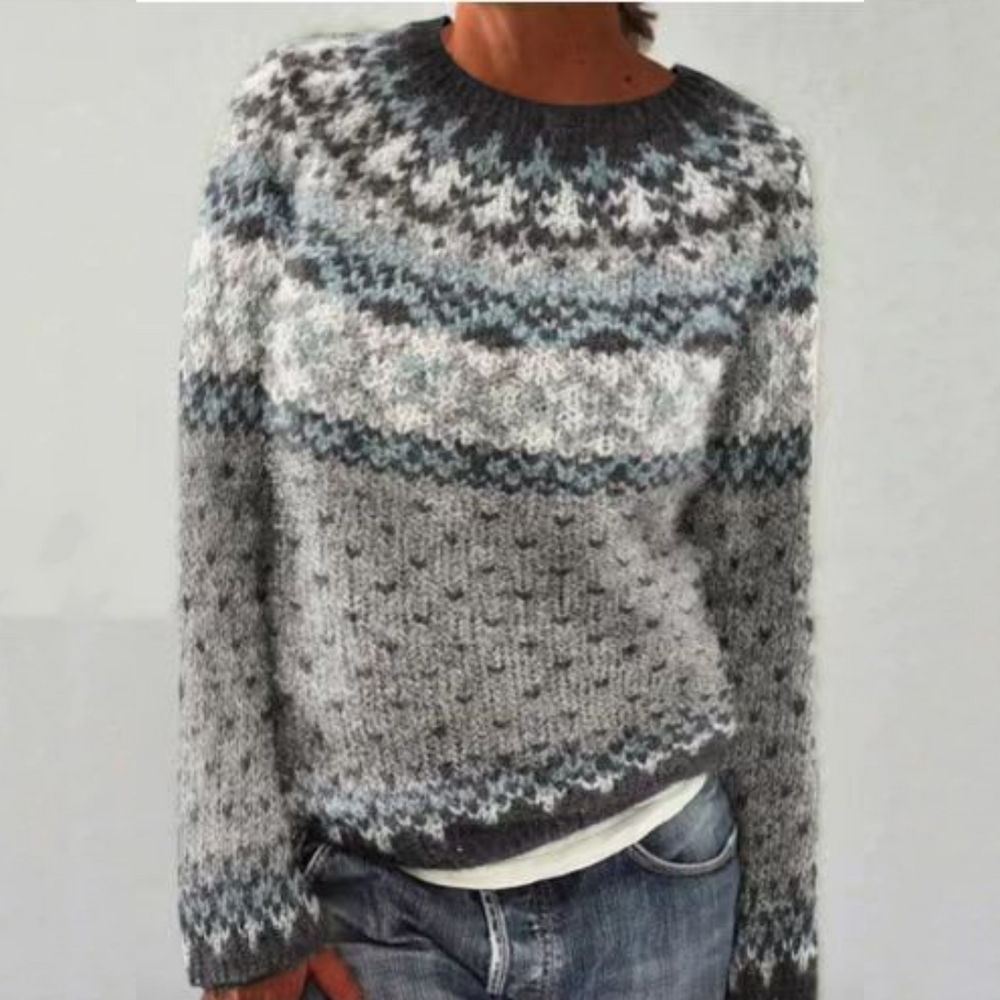 Clara retro Scandinavian knitted sweater in grey multi, front view worn with jeans