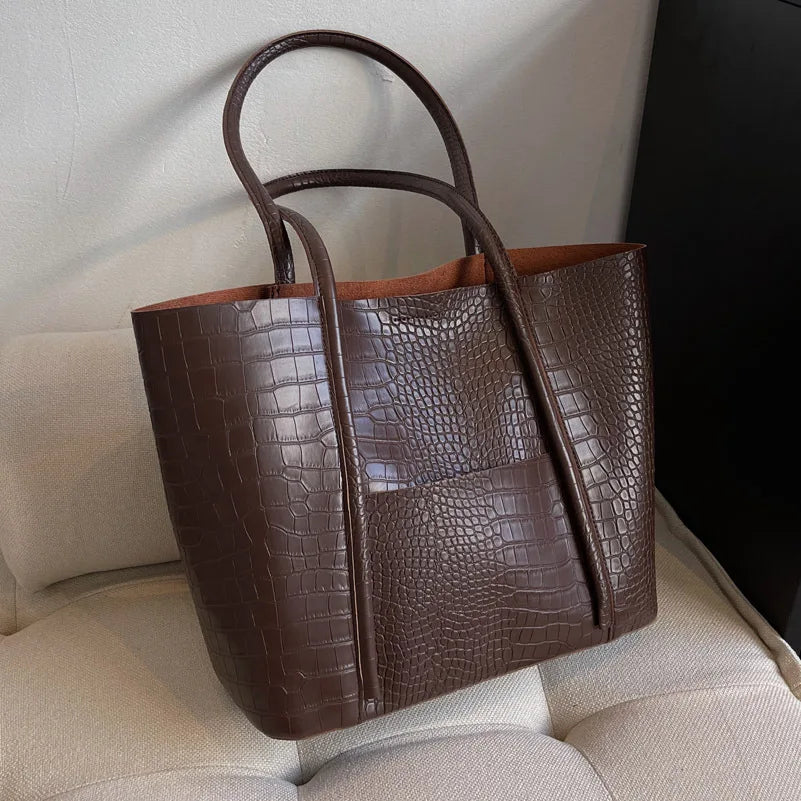 Sylvette croc shoulder bag in coffee, angled front view