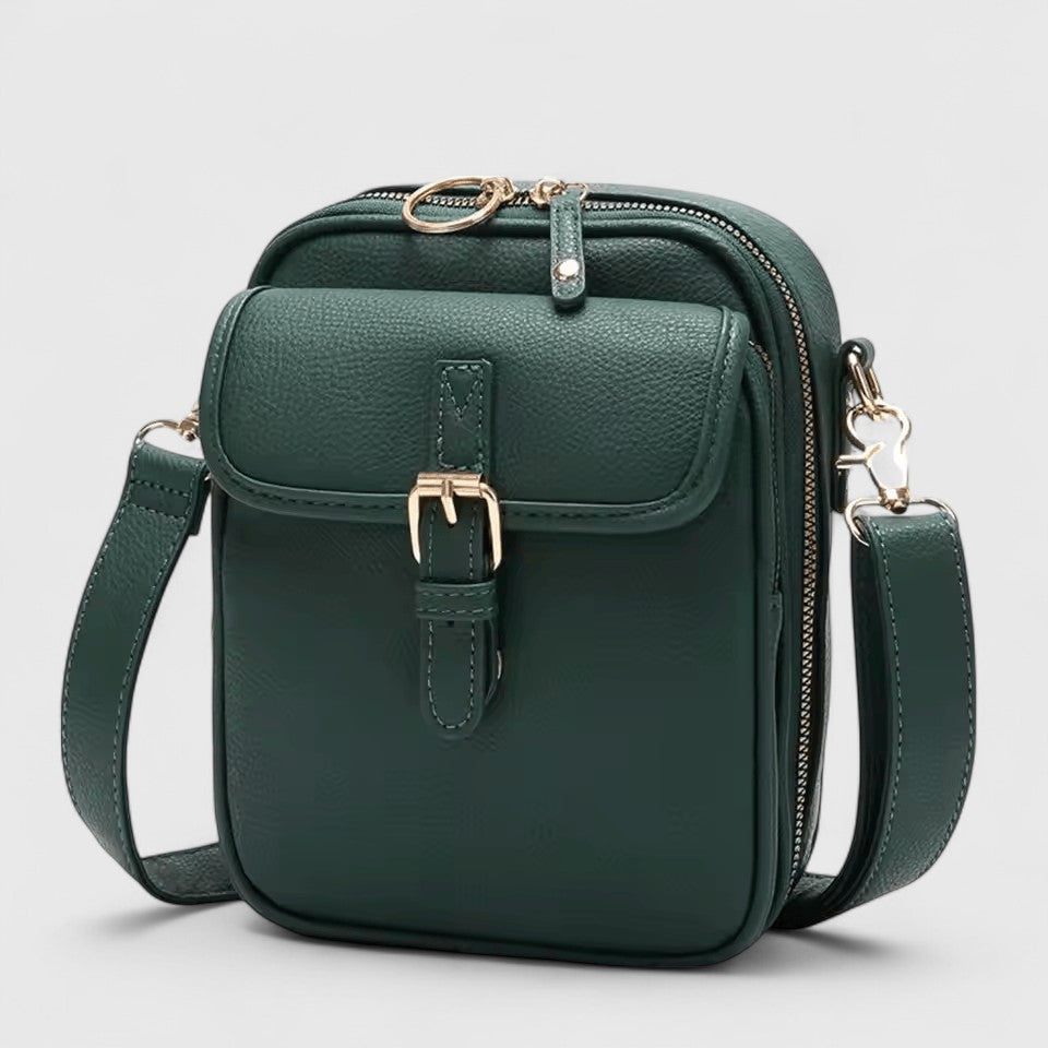 Seraphina crossbody bag in green, angled view showing side zip