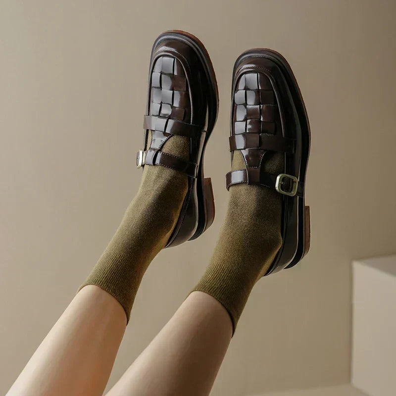 Isava retro flats in brown, close view of woven upper and buckle strap
