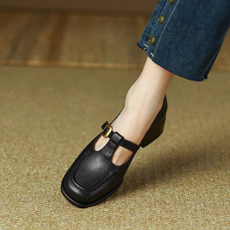 Selvana T-strap shoes in black, side view with block heel