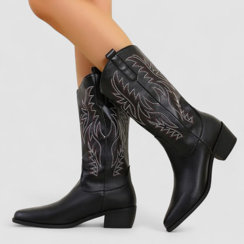 Sierra embroidered western boots in black, worn side view