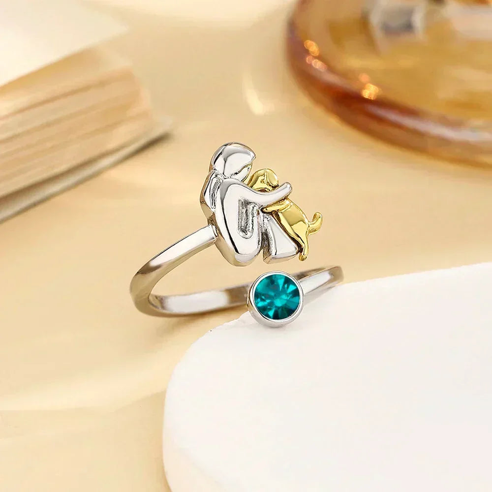 Vesporra dog icon ring with turquoise gemstone, angled view