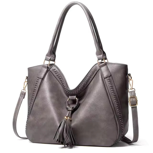 Elowen premium leather tote bag in gray, angled front view