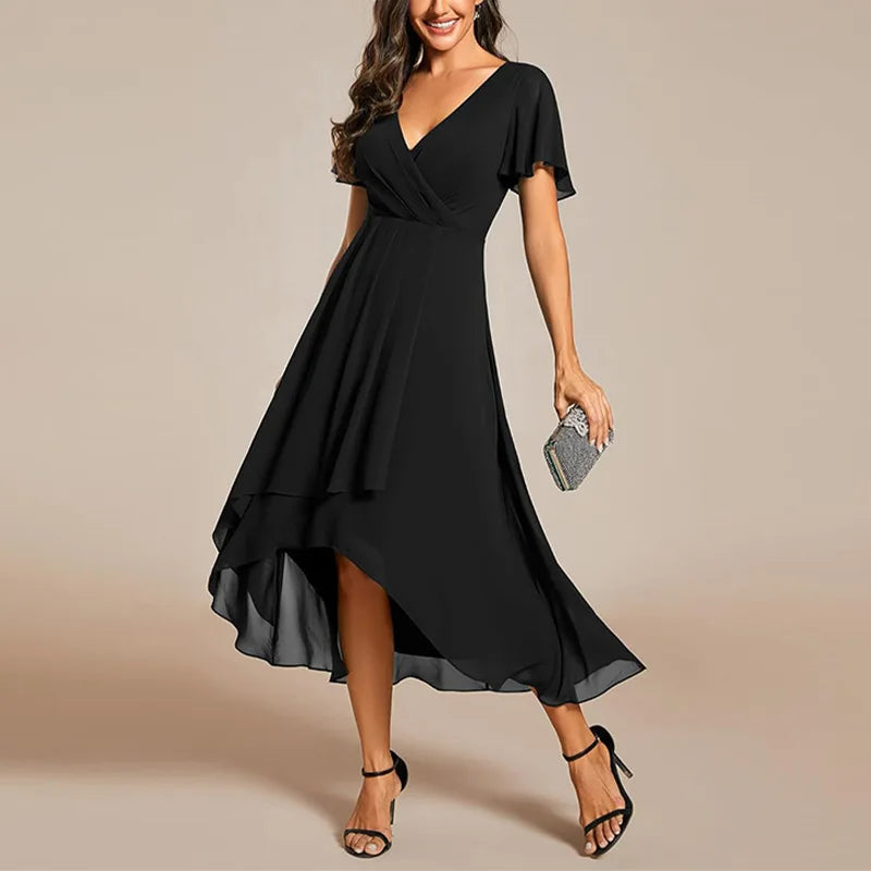 Ismey elegant flowing dress in black, full-length front view