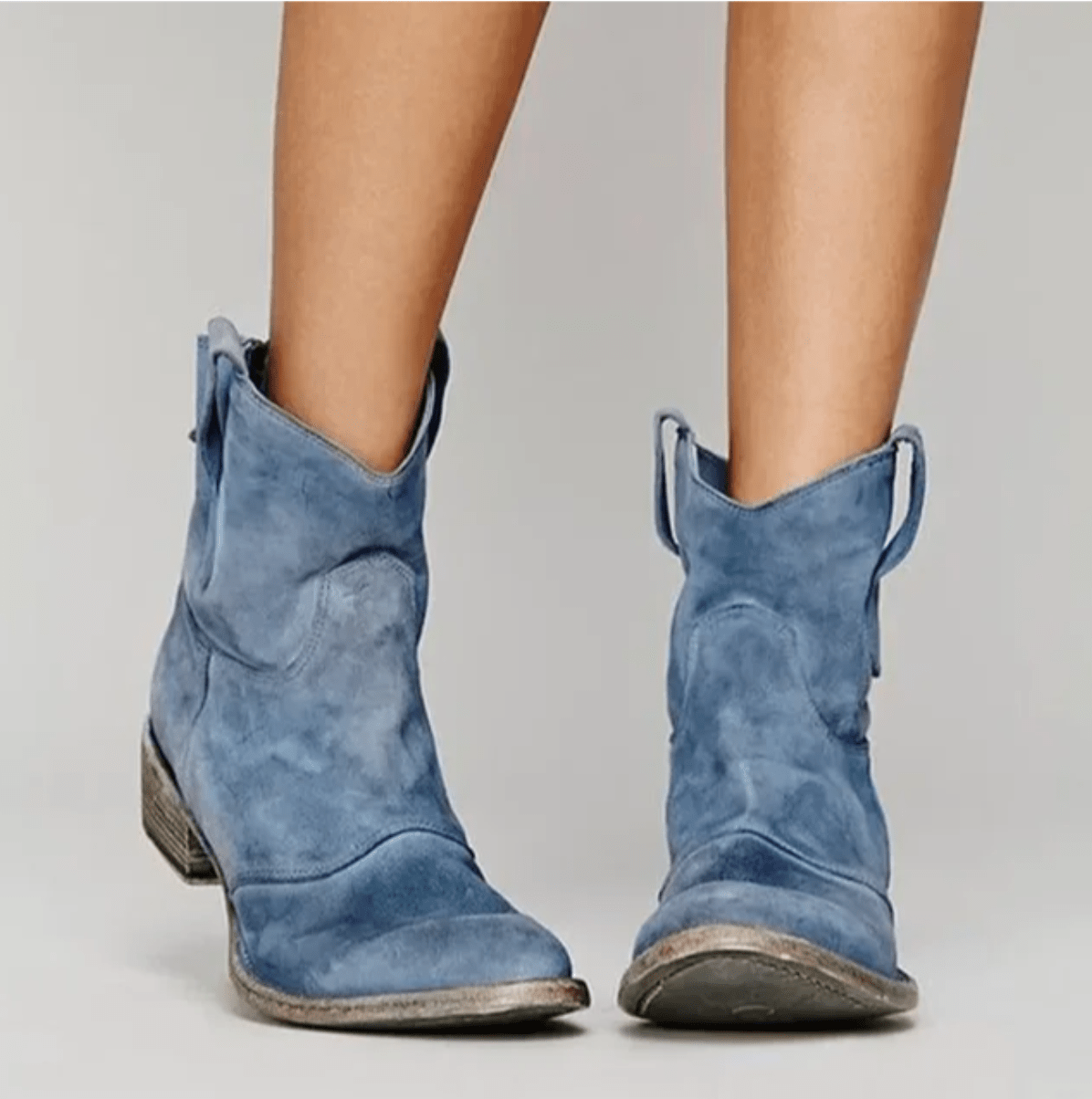 Piper western pull-on ankle boots in blue, worn front view