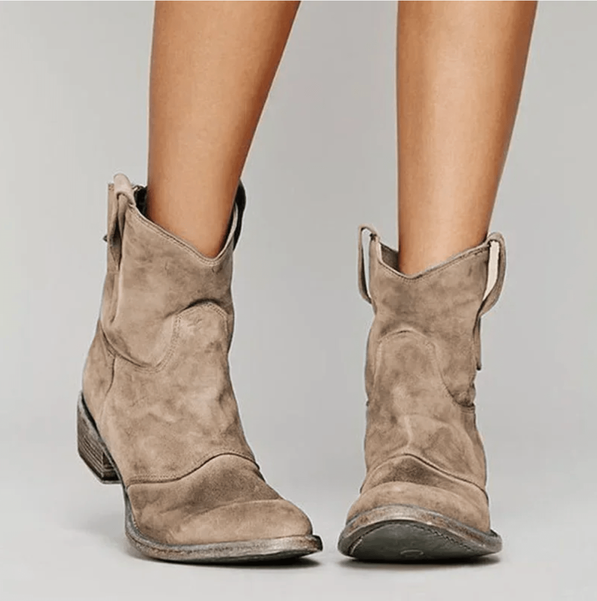 Piper western pull-on ankle boots in brown, worn front view