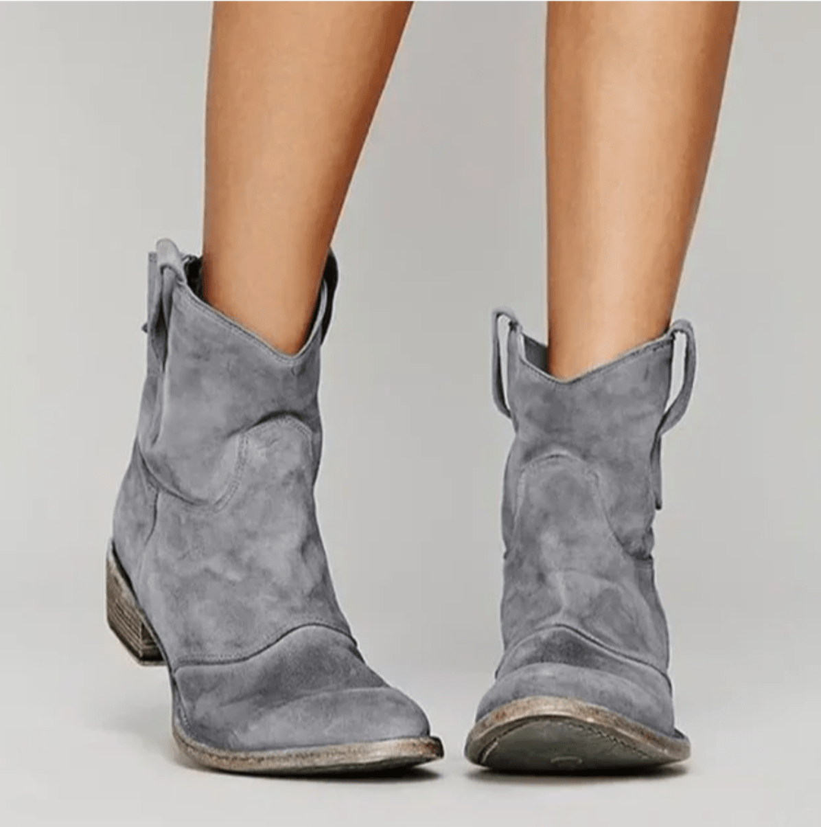 Piper western pull-on ankle boots in grey, worn front view