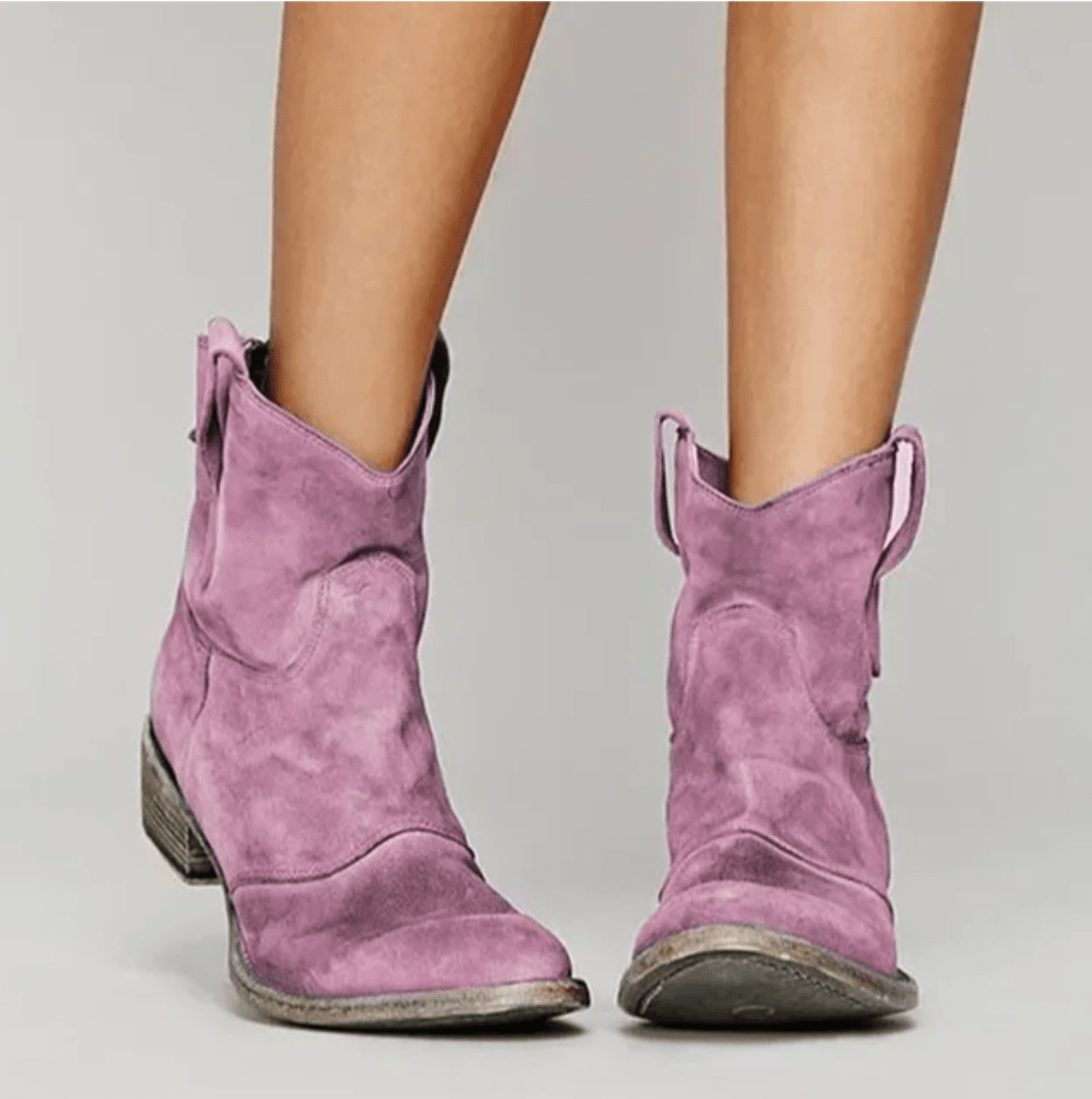 Piper western pull-on ankle boots in pink, worn front view