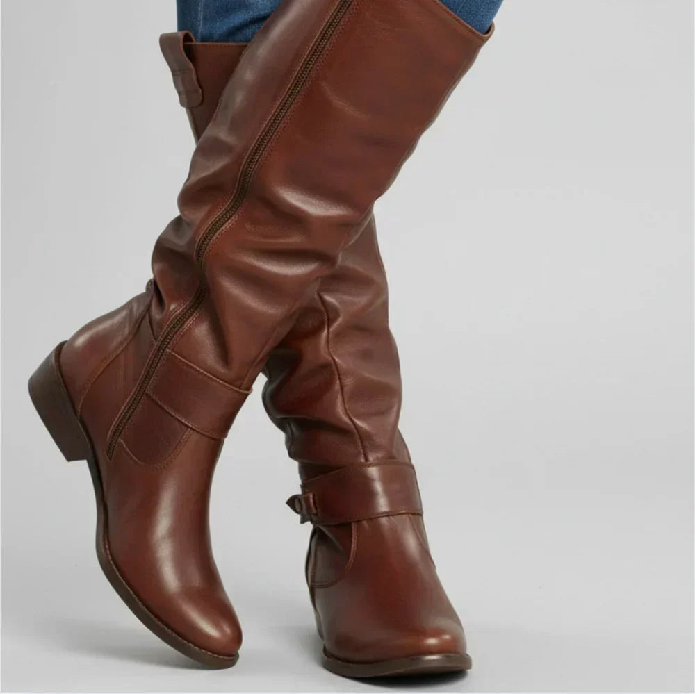 Novalyn tall boots in brown leather finish, worn close-up detail