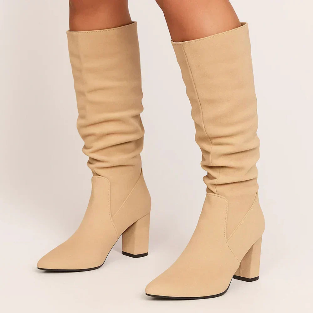 Lanora slouch knee-high boots in beige, worn front view