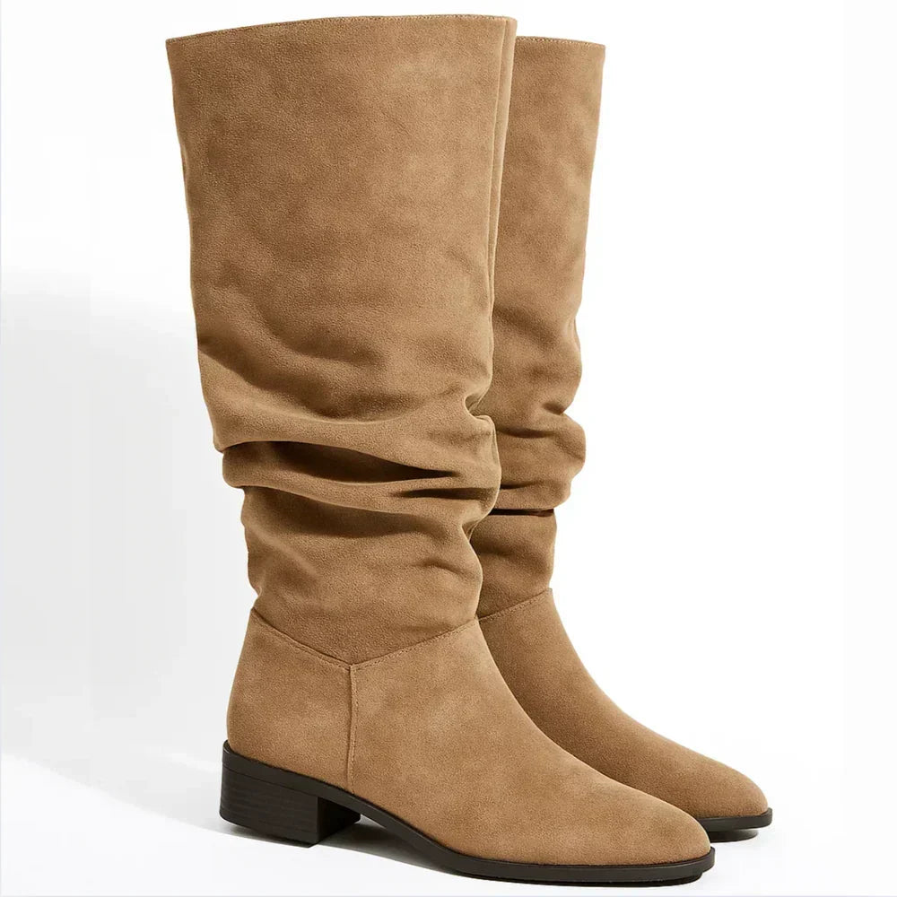 Roselia knee-high suede boots in beige, angled pair view