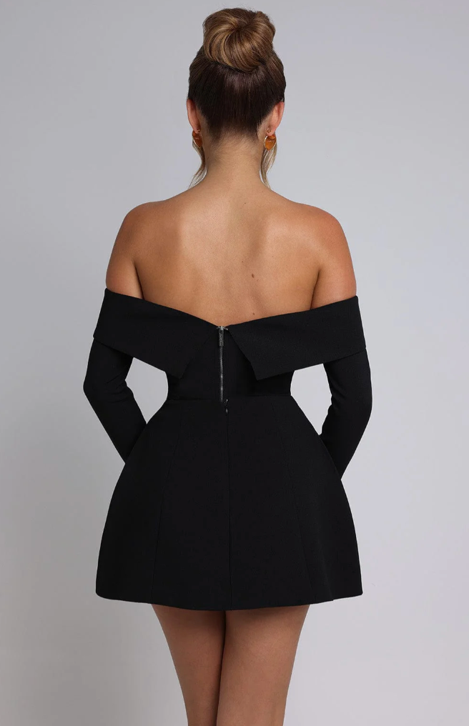 Nyra skater dress in black, back view showing exposed zip