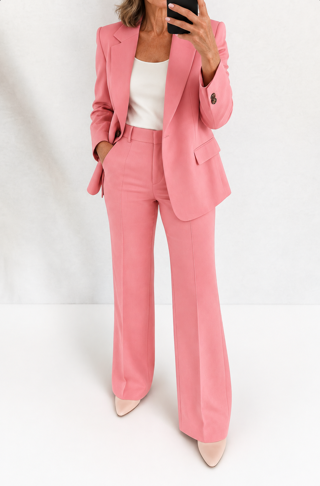 Araminta classic wide-leg trouser suit in pink, full-length mirror view