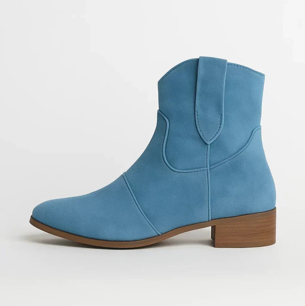 Suedellea Western ankle boot in blue, side profile view