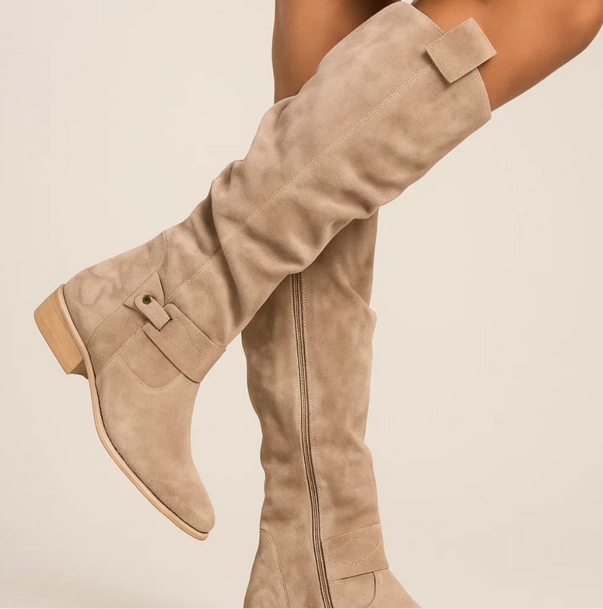 Coraline suede boots in beige worn, close-up of slouched shaft