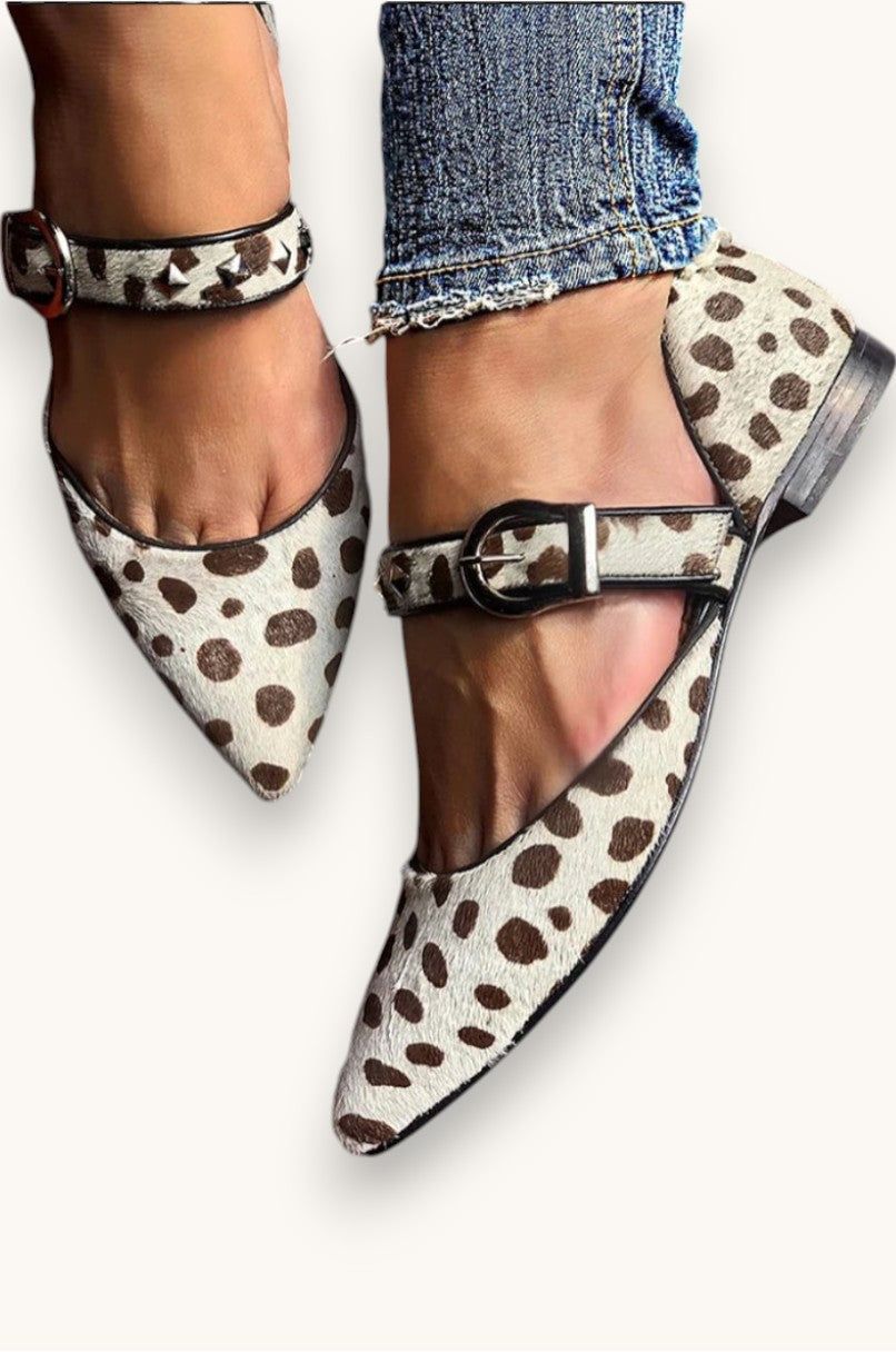 Eleanor Mary Janes in beige spotted print with buckled ankle strap, side view