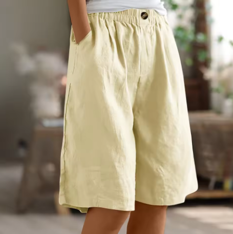 Diane comfort shorts in pale yellow, front view on model