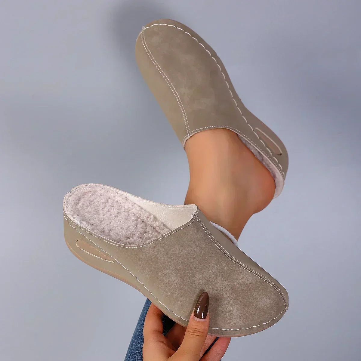 Sophie orthopaedic slippers in brown, pair held showing inside