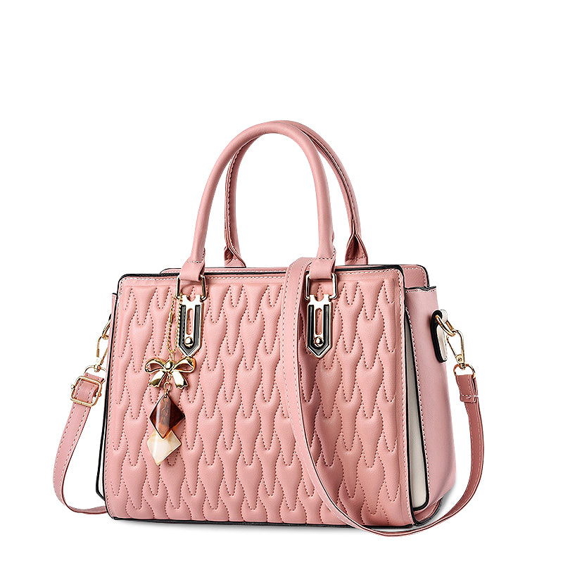 Vellora shoulder handbag in pink, angled front view