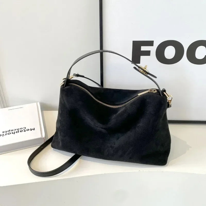Marielle minimalist shoulder bag in black, front view with top zip