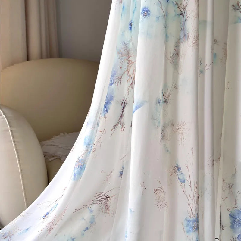 Morwenna long dress skirt detail showing blue watercolour floral print
