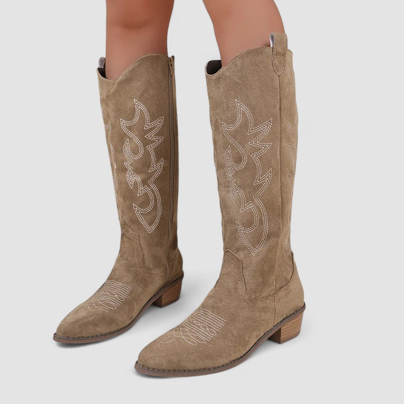 Cornelia western boots in khaki, worn front view with stitch detail
