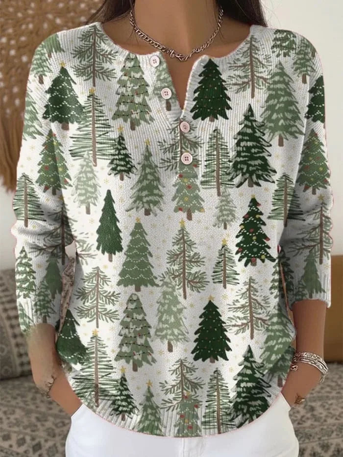 Anwen Christmas jumper in white with green tree print, front view