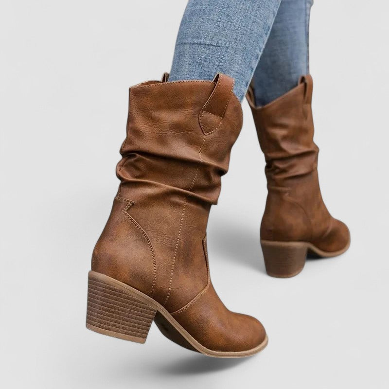 Eleanora slouch heeled boots in brown, close view of stacked heel