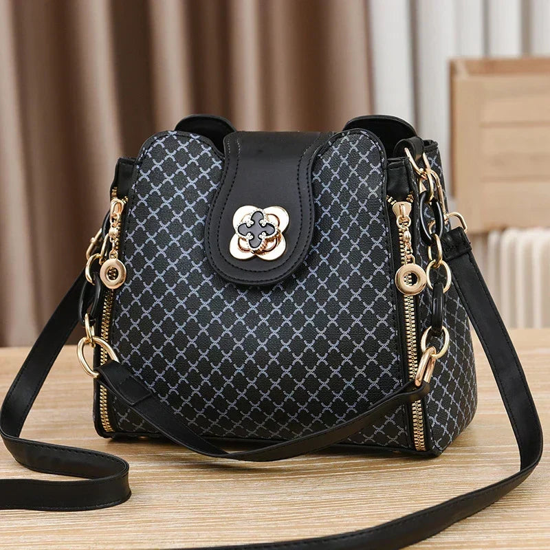 Marjorie charm bag in black, front view