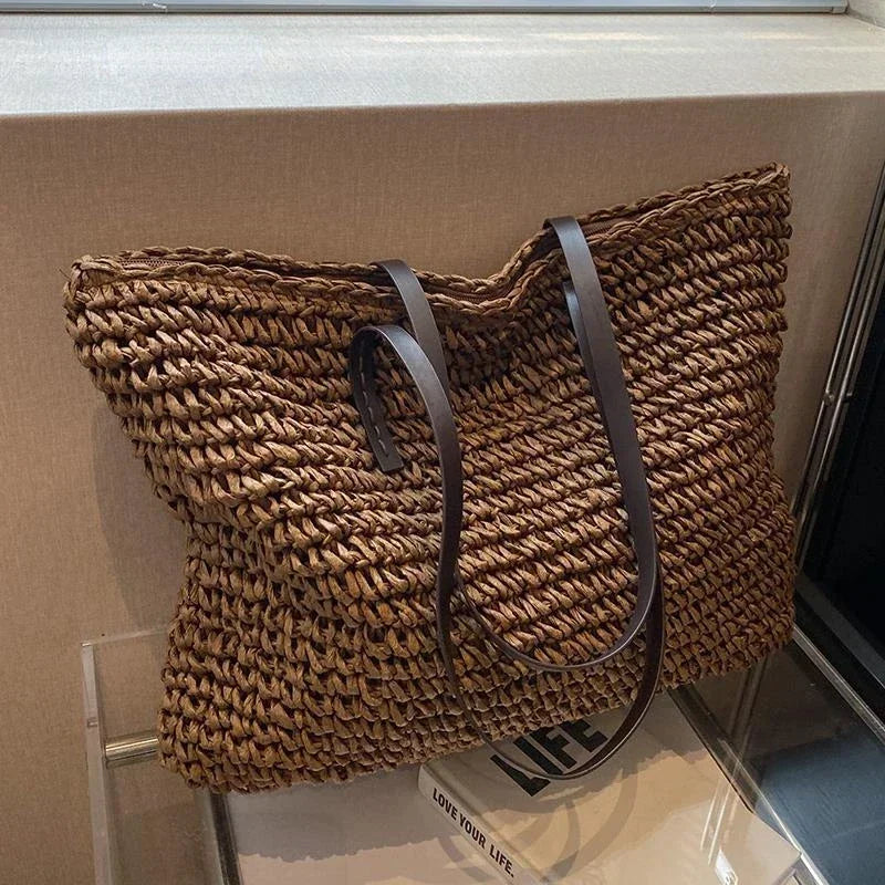 Large woven tote bag in coffee, side view