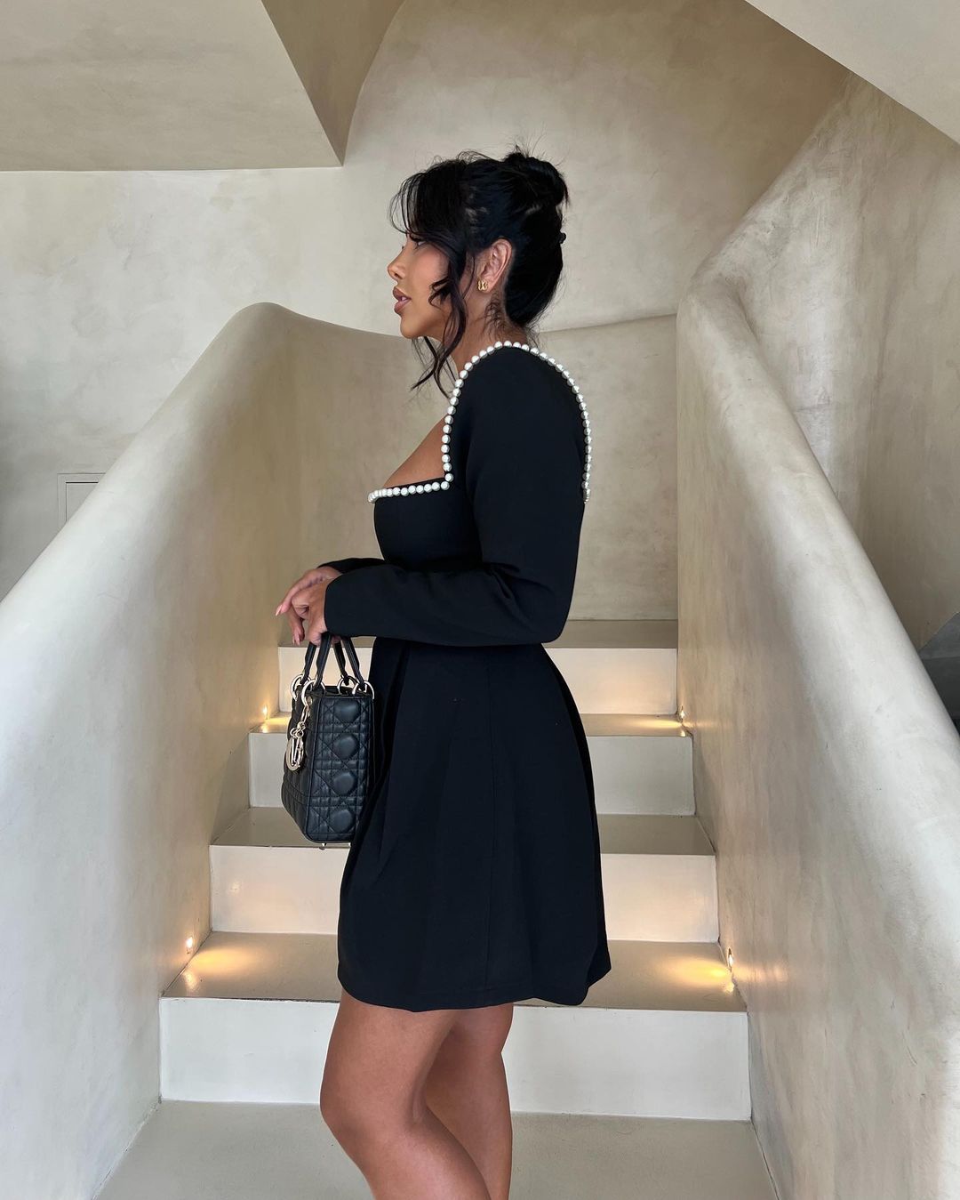 Elliott pearl dress in black, side view
