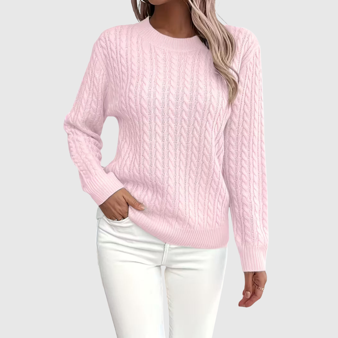 Isla cable-knit sweater in pink, front view on model